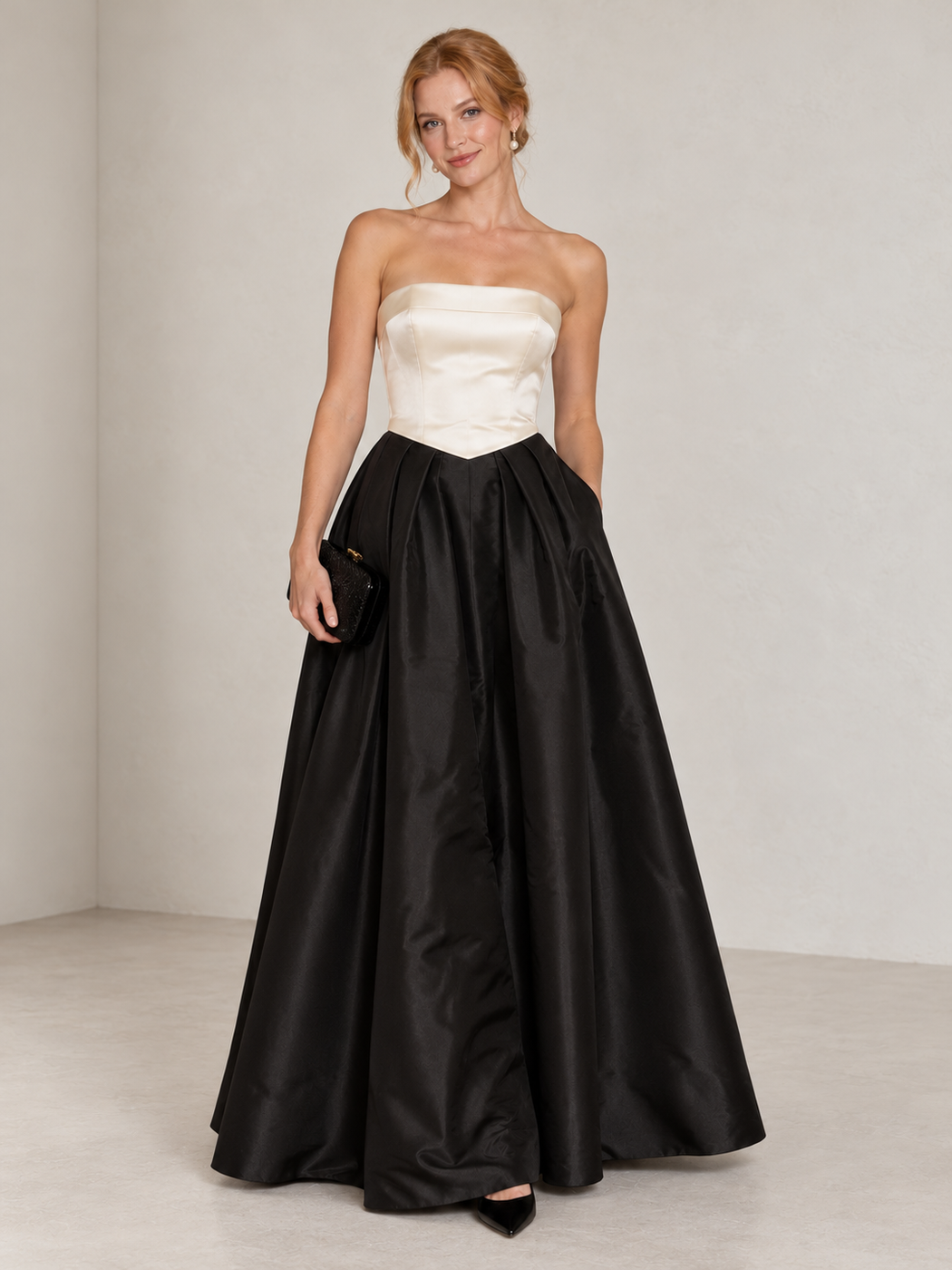 Ivory strapless bodice with a full black taffeta skirt and black pointed heels
