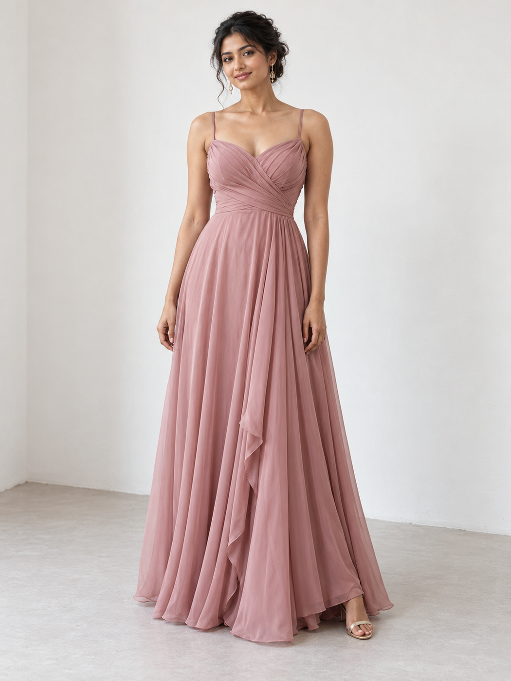Dusty rose chiffon gown with a ruched bodice and thin straps