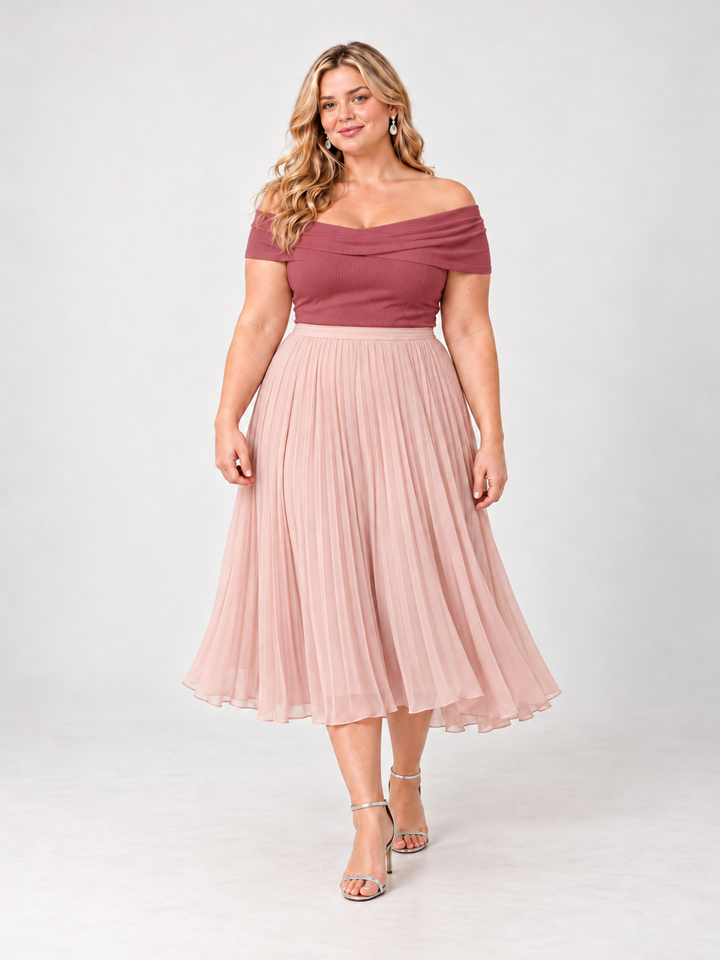 Rose off-the-shoulder top with a blush pleated midi skirt and strappy heels