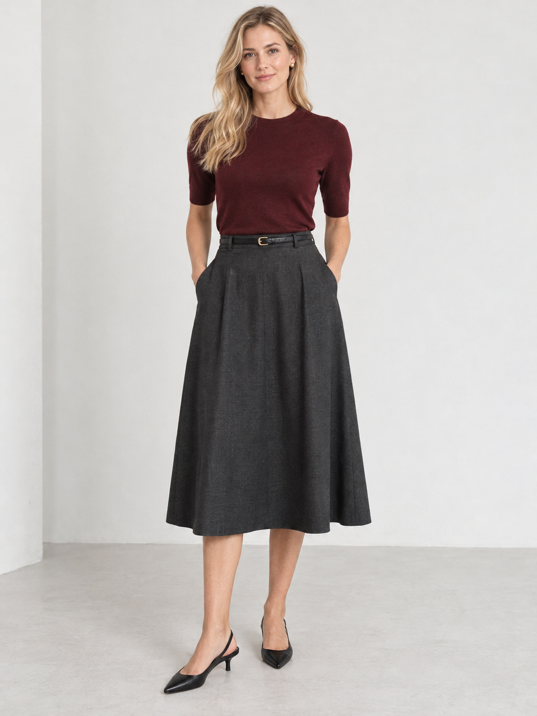 Burgundy short-sleeve top with a charcoal midi skirt and black slingbacks
